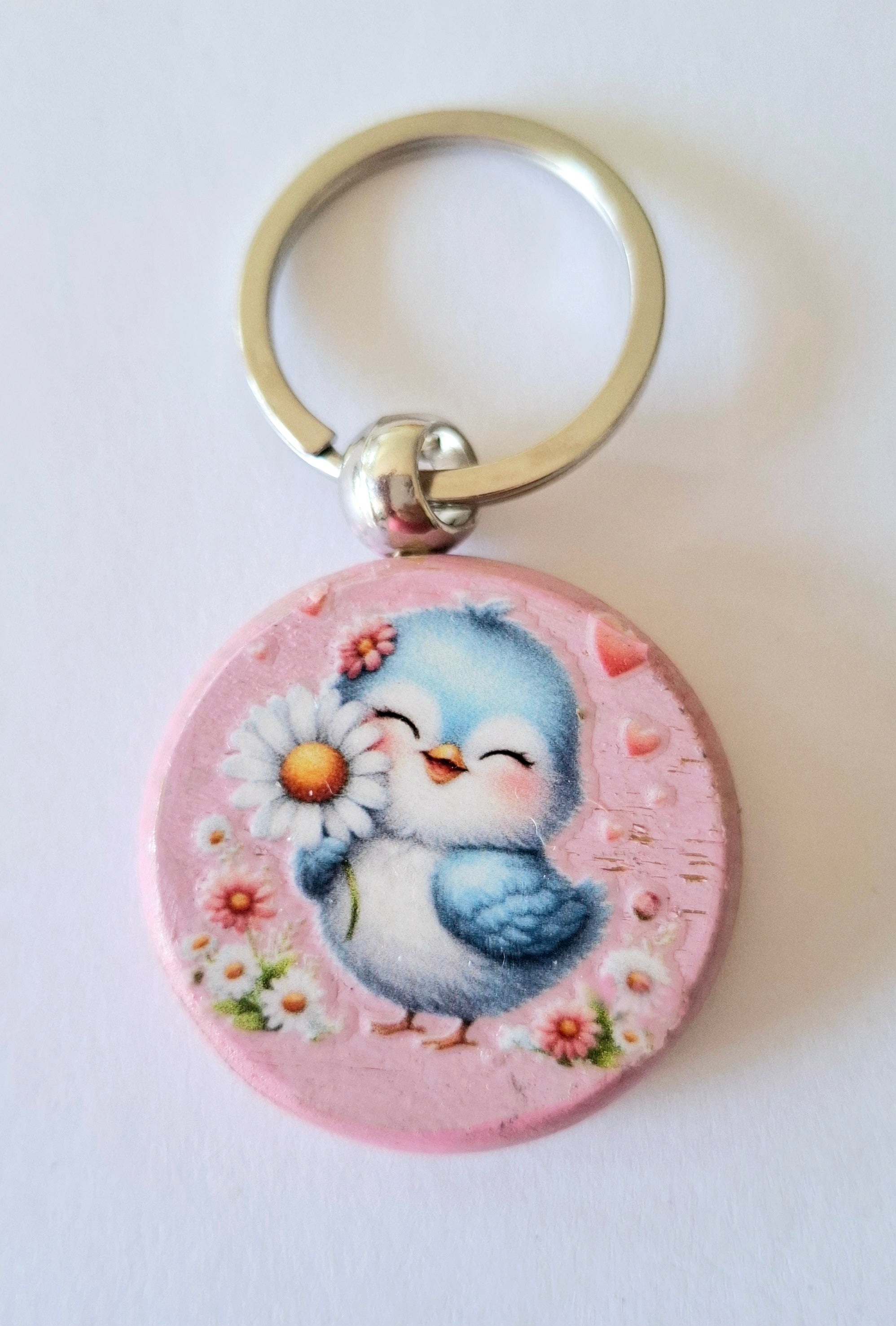 Porte clés oisillon bleu et fleur