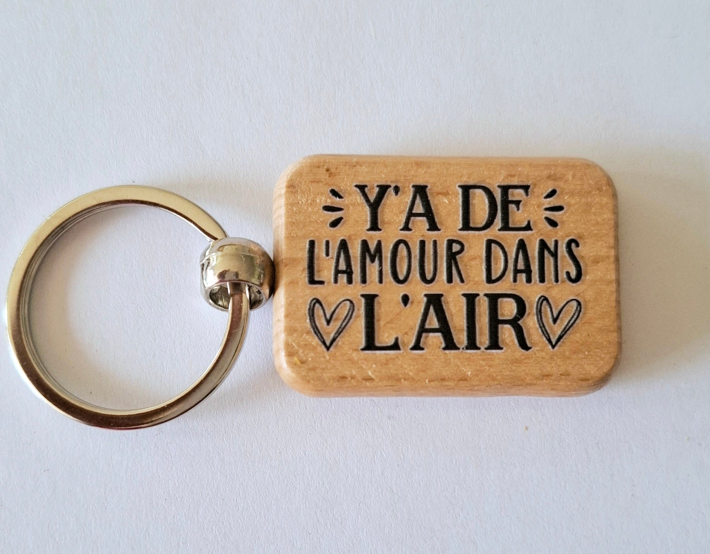 porte clés bijou de sac texte Y'a de l'amour dans l'air