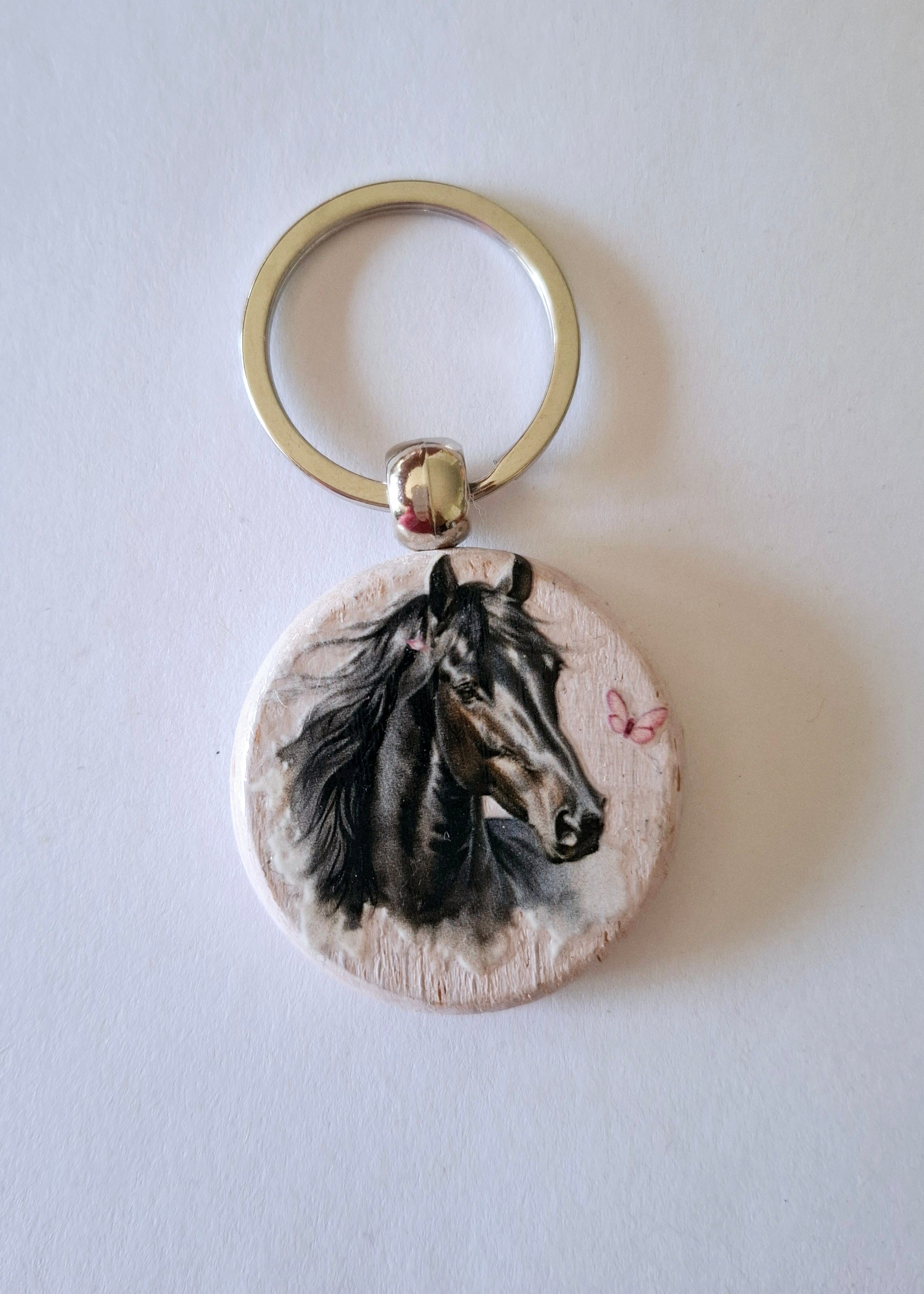 porte clés cheval noir et papillons