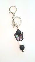 Papillon noir et multicolore