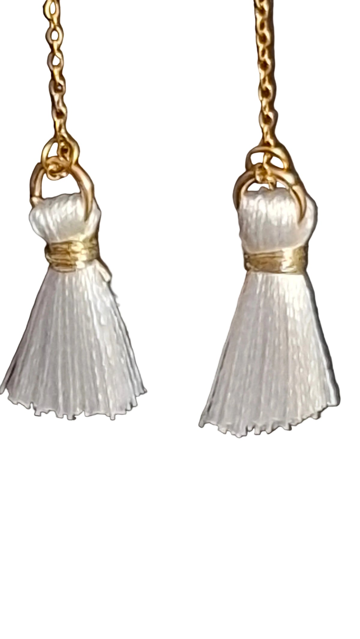 longues boucles d'oreilles pompon