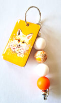 Renard et fleurs